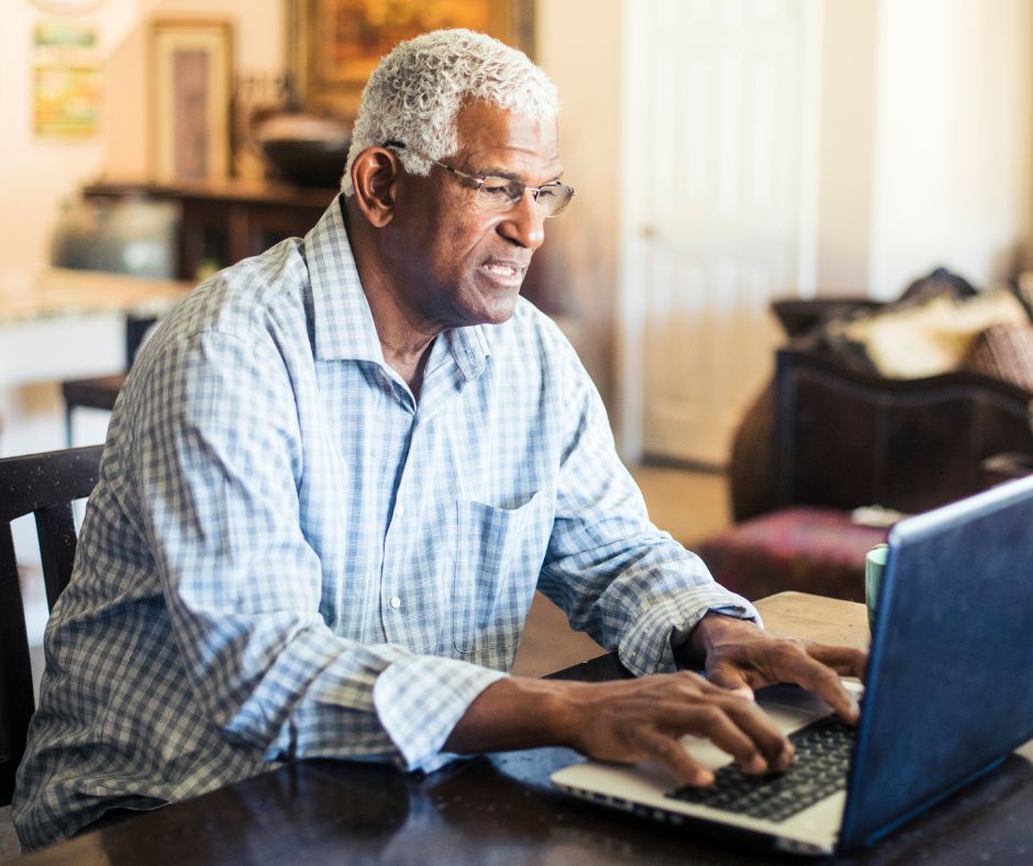 A man using a laptop computer